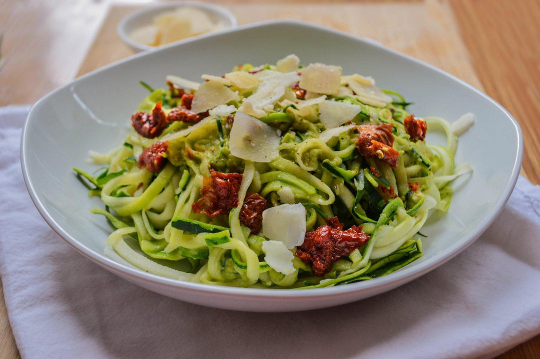 Zucchini Noodles with Creamy Avocado Pesto and Sun-Dried Tomatoes